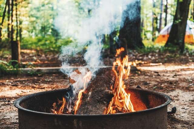 Brown firepit with flames, perfect when bush camping.